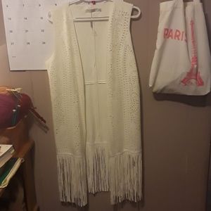 White tassles vest.